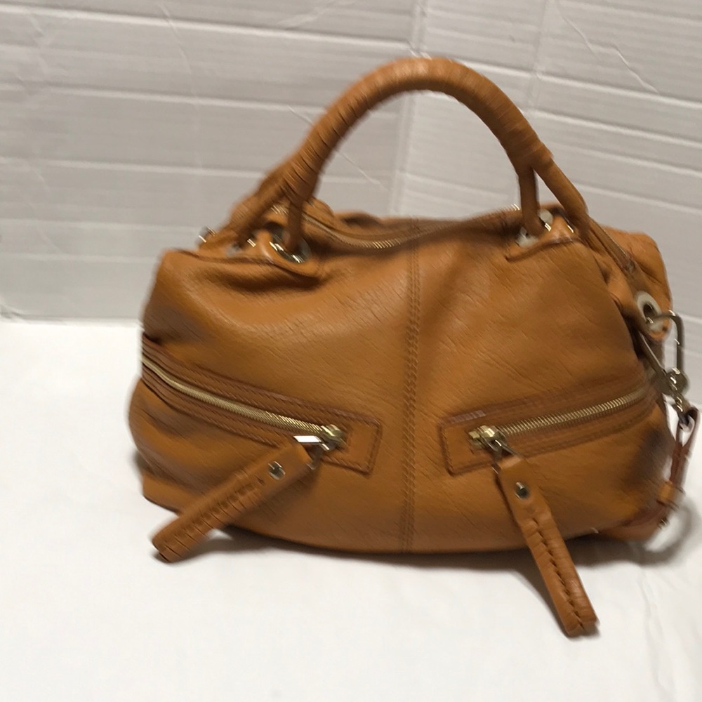 Michele slouchy buttery soft leather bag with braided handles & shoulder strap.